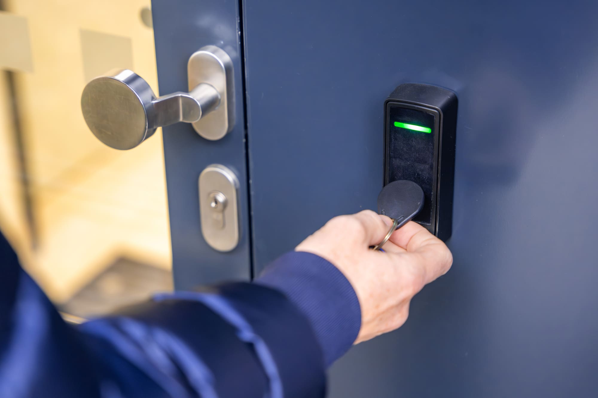 Access Control Systems for Euclid Businesses: employee badges in with keyfob at office door